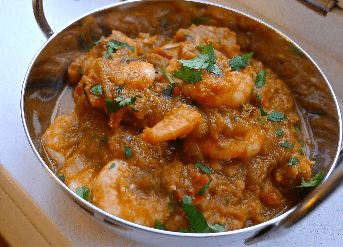 Prawns in a rich curry sauce, finished with fresh coriander
